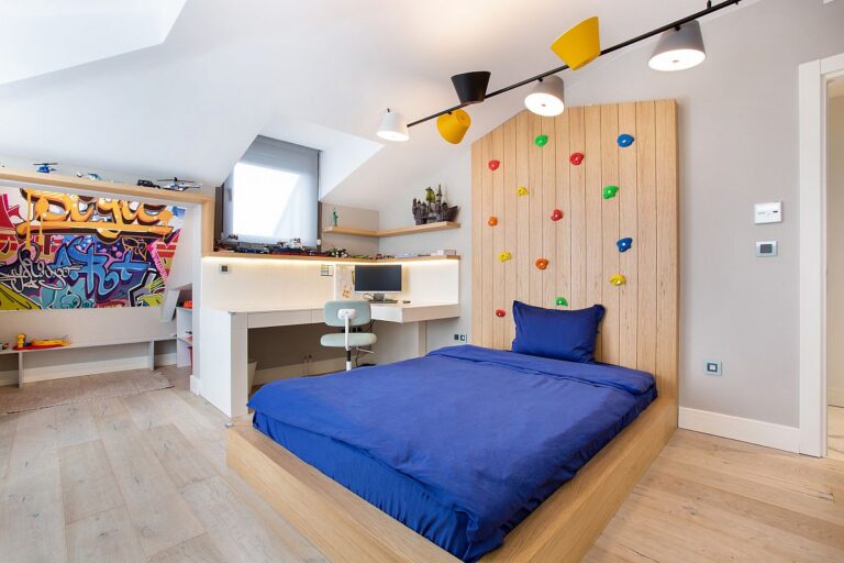 Modern kids bedroom with compact study zone climbing wall and a relaxing ambiance in neutral hues 51564